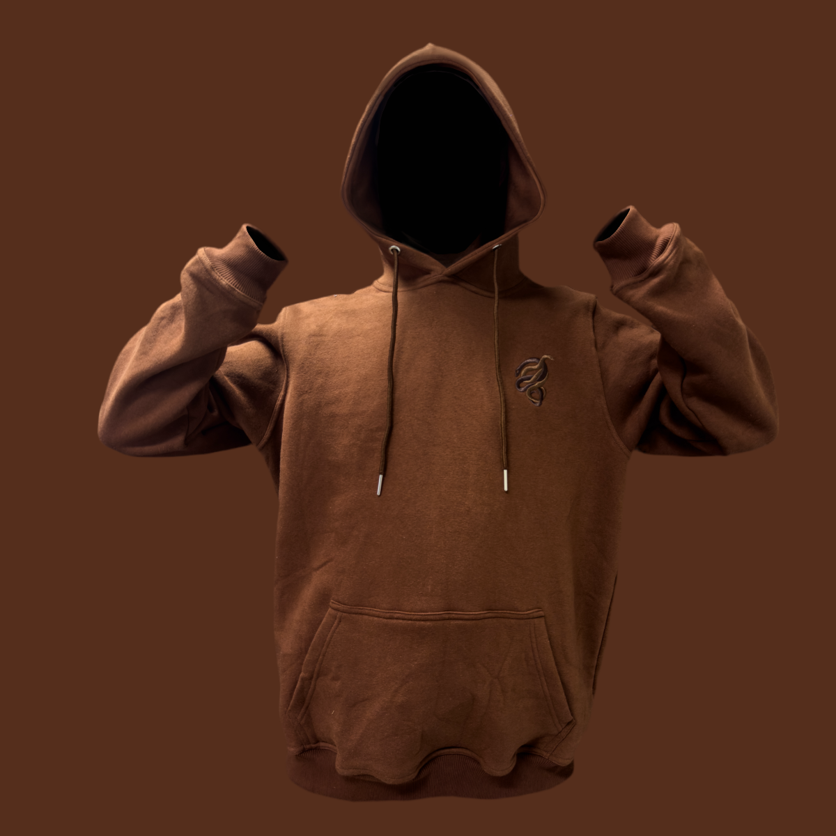 Premium brown oversized hoodie with modern streetwear vibes, featuring ultra-soft cotton polyester blend for all-day comfort. Designed for versatility, this unisex hoodie offers a relaxed fit, perfect for layering or casual wear. Available in trending neutral tones, it’s the ultimate staple for cozy winter outfits. Durable fabric, stylish drawstrings, and a kangaroo pocket make it ideal for lounging, travel, or outdoor adventures.