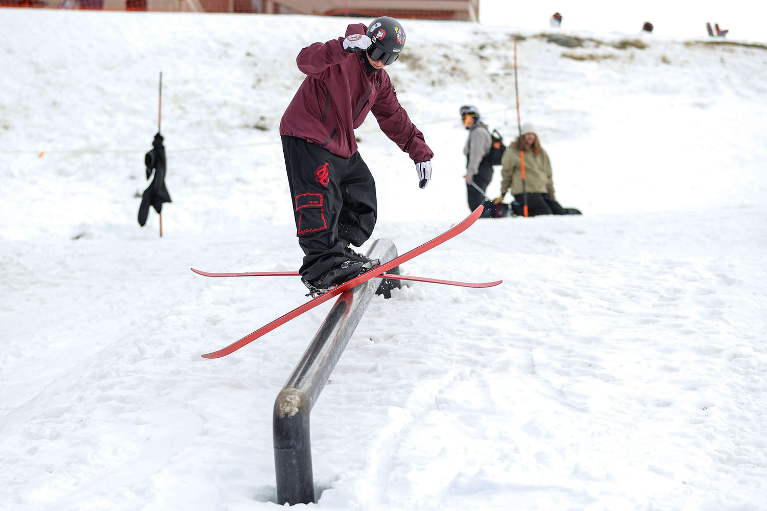 Rail sliding in baggy snow pants.