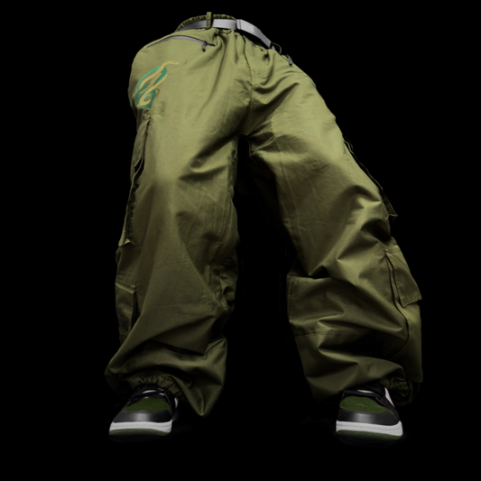 Baggy green snowpants, ideal for snowboarding and skiing. These are durable, and waterproof pants.  showcasing a stylish look for both ski and snowboard enthusiasts. Perfectly crafted to combine fashion and function, these baggy ski pants ensure comfort and mobility on the slopes.