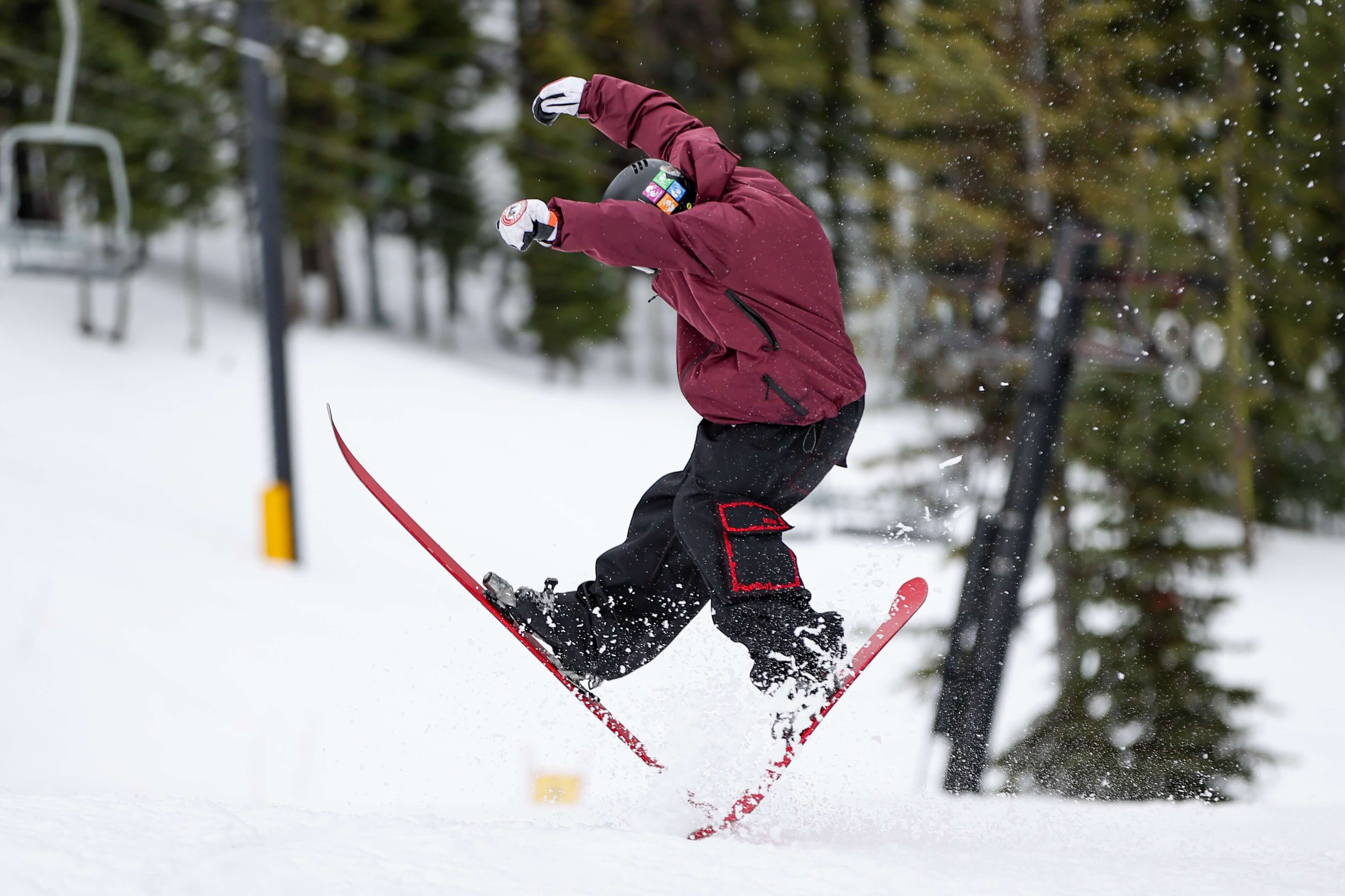Doing tricks in baggy snow pants.