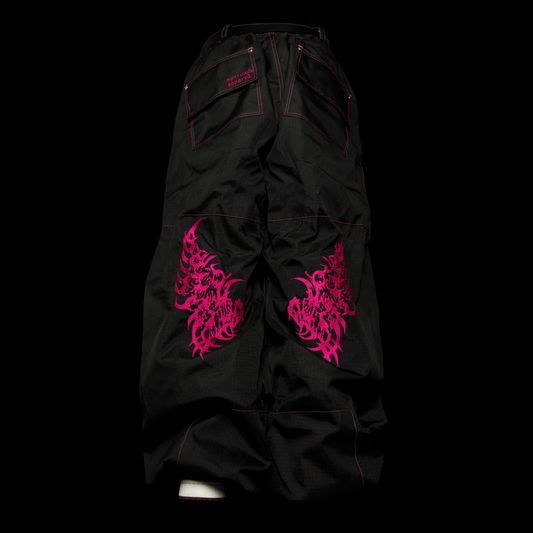 PINK ON BLACK BAGGY SNOWPANTS with tribal designs on the back